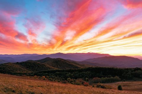 Golden autumn sunset over Max Patch with rolling mountains
